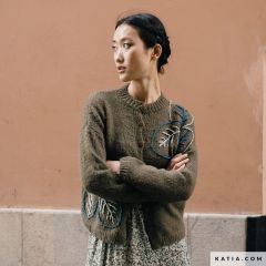 Vestje met geborduurde motieven in Merino Sport & Snowy | Katia